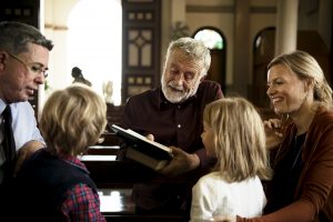 Priest with children